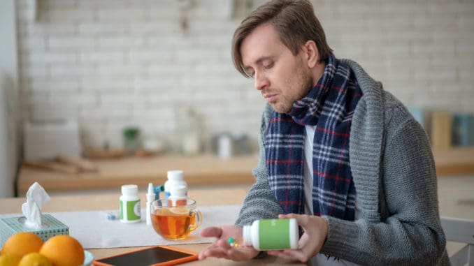 Man taking medication