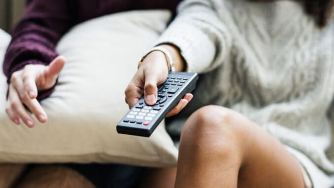 Couple watching a tv show together